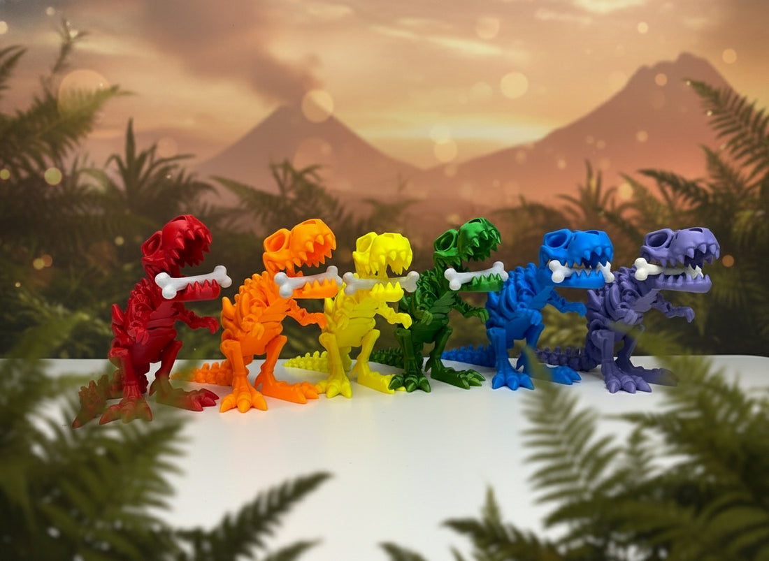 Colorful dinosaur skeleton models arranged on a table against a gray wall.