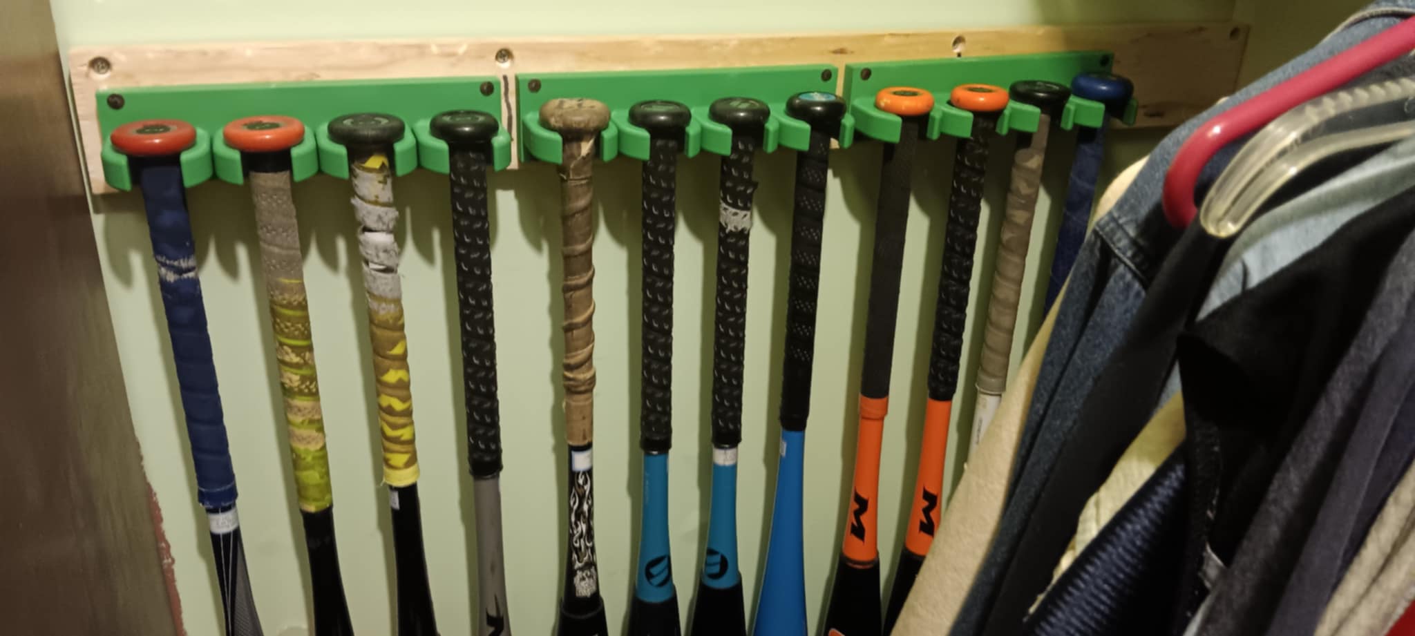 to hang softball bats up